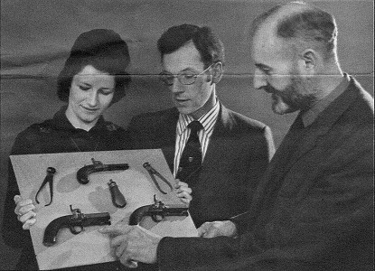 Bank staff with pistols