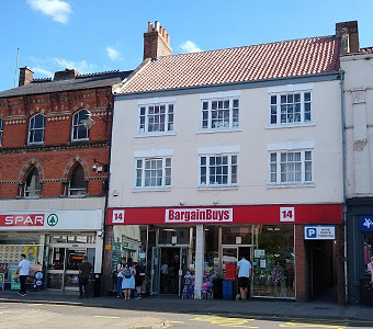 BargainBuys on the site of the Fleece Inn