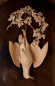 Carving of woodcock and vegetation